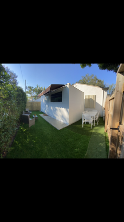 Outside patio - Beautiful Private Fully Furnished Cottage two blocks from Campus