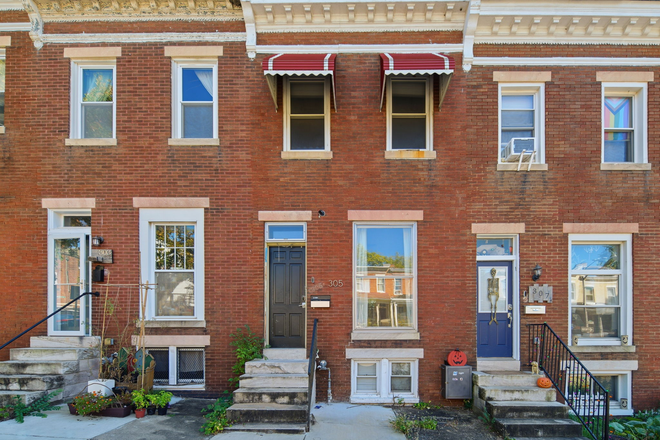 Front of House - Solar-Powered + Furnished Townhouse w/ All Utilities Included Walking Distance from JHU