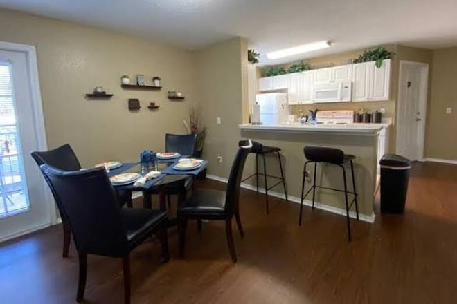 Kitchen/Dining area - Boardwalk at Alafaya Trail Apartments