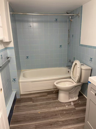 restroom - a furnished bedroom with laundry and kitchen