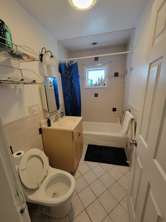Bathroom - Short walk to campus located on Boston Ave - Great location - off street parking included Apartments