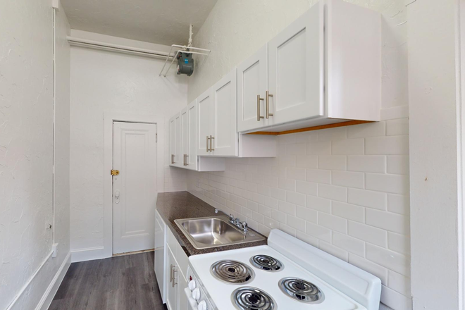 Visit hubrealtyproperties.com - Huge 1 bedroom, with kitchen dining area, on green line T Apartments