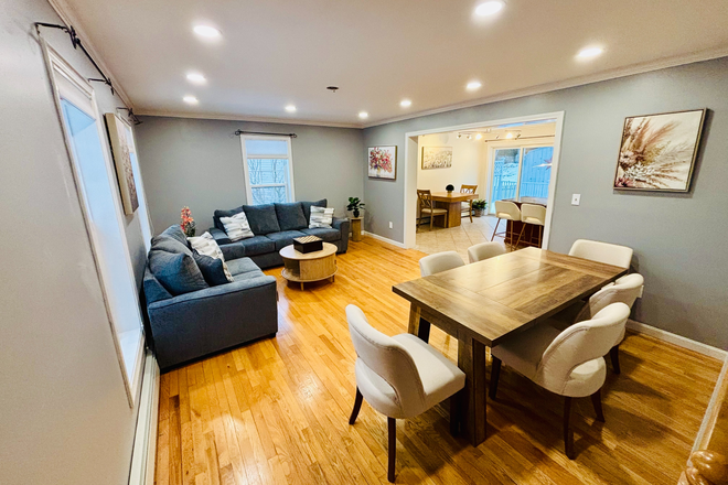 Living/Dining Room - Newly Renovated 5 BR/3BA Near URI - Brand New Furniture
