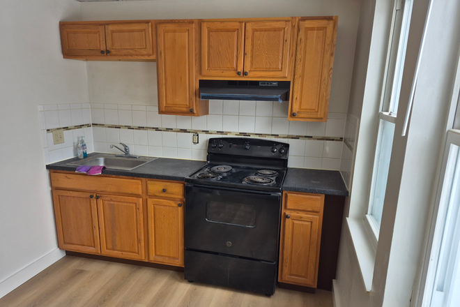 Kitchen - Aug. 1 One Bdrm apt: new floors & refrig, newer Kitchen, Bath,  Heat incl, Laundry in bldg