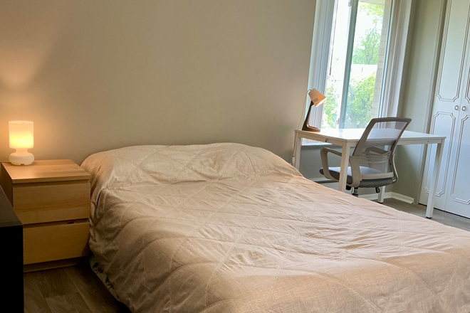 Bedroom - Summer Sublease – Furnished Room with Balcony Near Downtown Ann Arbor Apartments