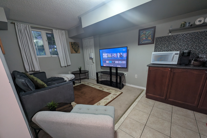 Living room pic 2 - PRIVATE BASEMENT APARTMENT - WALK TO YORK, ALL-INCLUSIVE, FURNISHED, FREE CLEANING