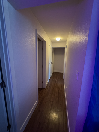 Hallway to Bedroom - The Lodge Apartments