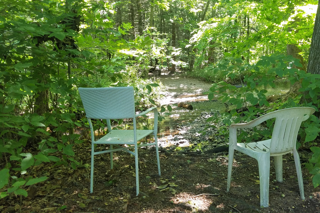 back yard view of Mill River - 81 Summer Street - 3BR 1.5 BTH Duplex (Puffers Pond) Apartments