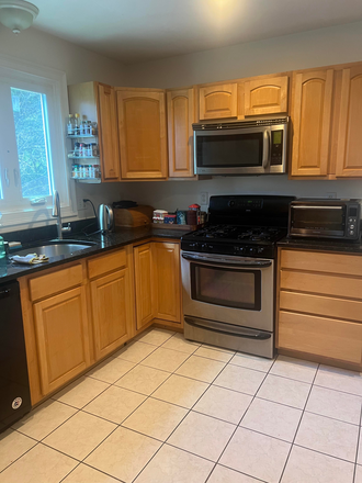 Kitchen - Two bedroom duplex with furnished basement in North Cambridge Duplex