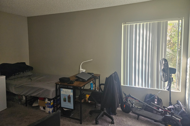 The half of the room you will be living in. You can see the bed and desk if you wanted me to leave it for you. - Campus Crossings Riverside Apartments
