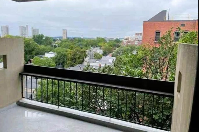 Balcony - Spacious 2 bed 2 bath condo in Central Square! FIRST MONTH IS FREE if signed before 01/01/2026!