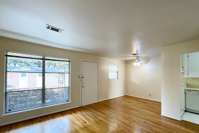 Living space, with floor to ceiling windows - Mount Vernon Apartments