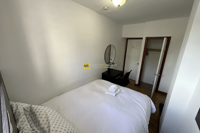 Bedroom - Marc Roos Realty Apartments