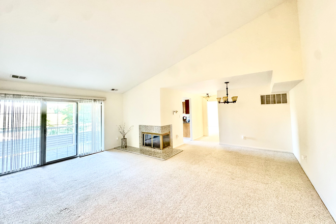Bright sunny open floor layout with cathedral ceilings in dining / living area - Bright, Pristine 2 BR / 2 BA Penthouse Condo in Canal Pointe - 5 Min Drive to Campus!