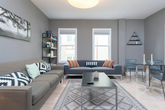 Living Room - Modern Central Sq 3 Bed with In Unit Laundry + Open Concept Kitchen Apartments