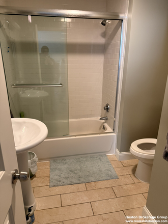Bathroom - Modern 3-Bed Retreat with Hardwood Floors & Easy City Access Apartments