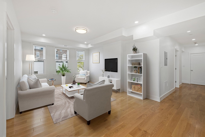 living room (virtually staged) - STUNNING 3 Bed / 2 Bath w/ LAUNDRY IN UNIT! Avail. 9/1/26!! Apartments