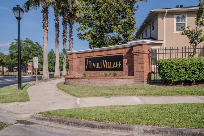 Community Entrance - Furnished 3/2 with Garage!  Great East Orlando Location Close to Colleges! Townhome