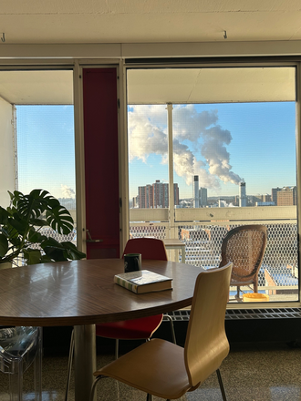 Dining table - Sunny One-Bedroom with Great Views in High-Rise Building on 14th floor Apartments