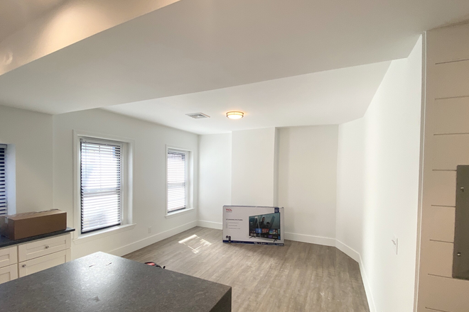 Living - Amazing, renovated 4 bedroom right on Tremont Street in Mission Hill Apartments