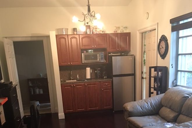 Living area and kitchenette - Beautiful large studio - Utilities + Internet included