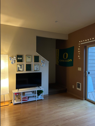 Living room - Looking for a fourth girl to live in our cute place at The Waverly, close to campus! Townhome