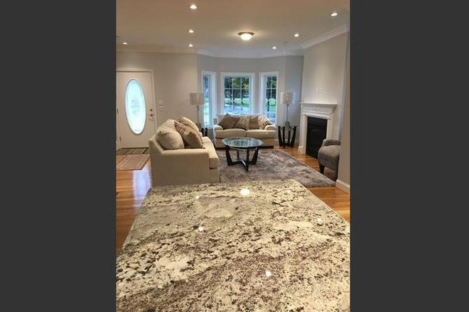 Open kitchen - Four levels of living and 5 minute walk to campus! Townhome