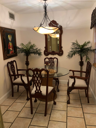 Dining room - Handsome furnished apartment in tropical setting right  across from Biscayne Bay .