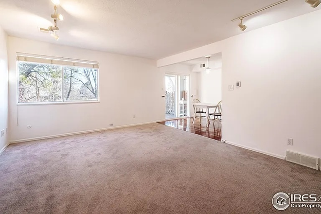 Living room. *Couch, TV, and other furniture not pictured but will be on location at start of semester. - Condo, Looking for a Girl Roomate!