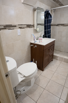 Shared bathroom - (Ideal For Vegetarian) Private room for rent in a shared basement at Barford Road House