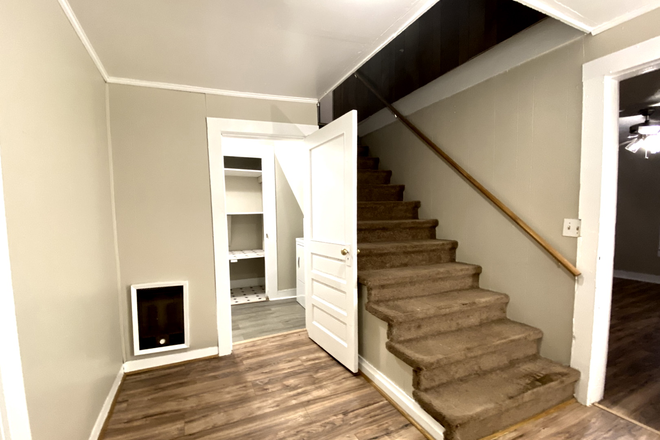 Dining room - 2-BR townhome in quiet area-laminate, hookups, central location-water, lawncare included