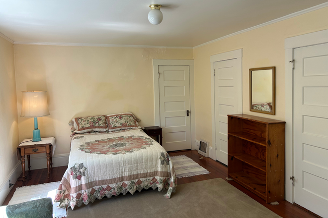 Bedroom from south-east corner - Room with Private Bath in Elmwood Brown Shingle