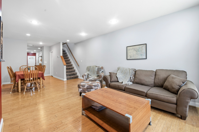 Living Room - Furnished 4 BR/1.5 BA...Steps from JHMI Townhome