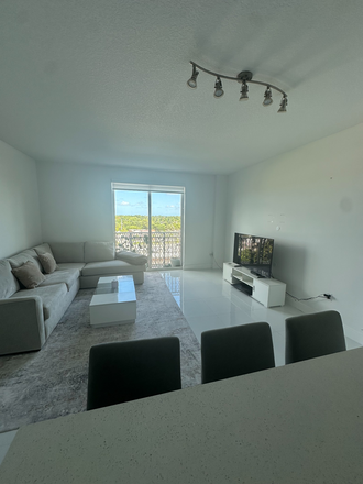 Living Room - UM student seeking roommate.  Fully furnished. 1 block from Metro; no car needed.