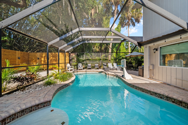 pool area - 5 bedrooms 4 full baths w/ heated pool & laundry room