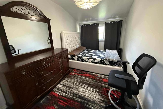 Bedroom - Comfortable Room with Patio Access Townhome