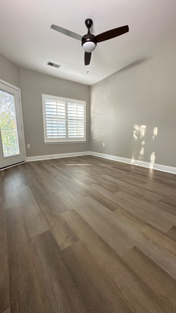 Bedroom 2 after new floors, lighting and plantation shutters - Quiet, Convenient 2BR/2BA Condo - Parking included