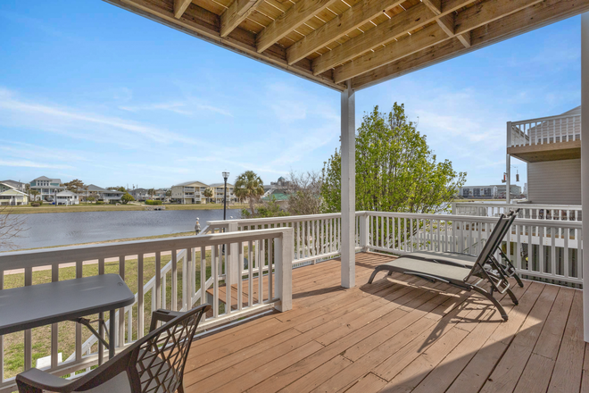 Common Area - Main level deck overlooking Carolina Beach Lake - Rooms Available Fall 2026 Townhome