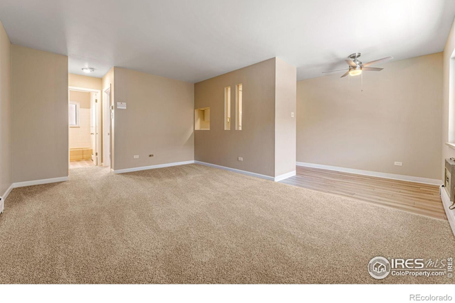 Living and dining room - Tired of roomates? Updated one bedroom condo, 1/2 block to campus, mountain views!