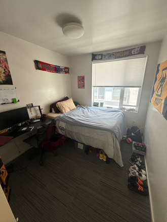 Bedroom is spacious. If you have a mattress, bed frame, desk and chair the rent goes down 30 bucks monthly - Yugo Courtside Apt 413, 3 minute walk to campus!