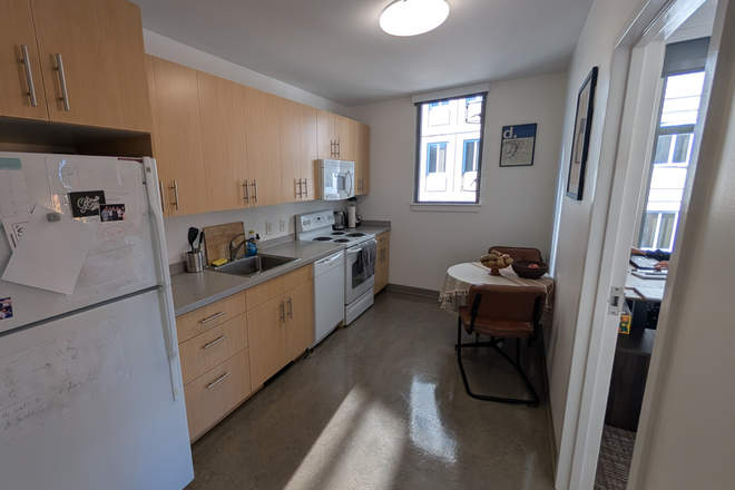 Kitchen and dining area. - Huge apartment near Harvard Square with great natural light for families or two roommates