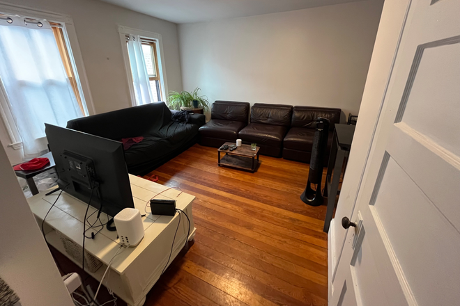 Living room - No Broker’s Fee!!  Updated Apartment. Free parking. Granite/stainless kitchen.