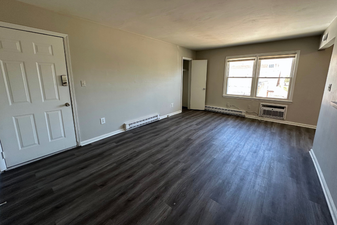 Living Room - ODUrent Offers 9511 First View St! Apartments