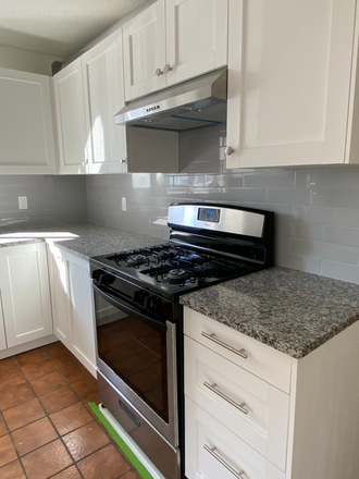 Kitchen - Room for rent in large, sunny 3 bedroom apartment in Inman Square