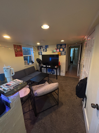 Living room from kitchen. - Come Live in the "Yellow Sub"!  Roommate Needed! Duplex