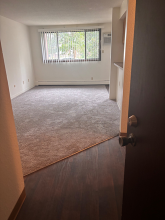 Living room view from apartment entry - Spanish Villa big and bright one bedroom in convenient location