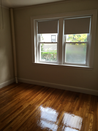 Hub Realty - Next to campus, large studio with alcove, and lots of light Apartments