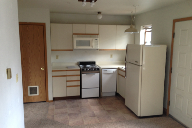 Kitchen - Charming Top-Floor 1-Bedroom with Two Balconies! Apartments