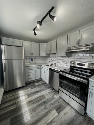 Kitchen - Modern Studio with Stainless Steel Appliances! Prime Downtown Location! Apartments