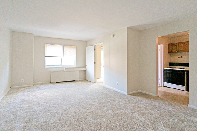 Living Room - 2 BD | 1 BA at College Park Towers - Knox Building